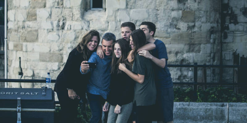 A Family Taking a Selfy After Accepting the Job of an Executor to Settle an Estate, Corona Estate Planning Attorney.