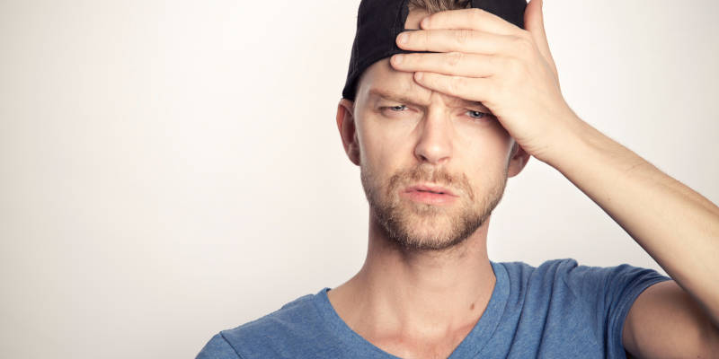 A Loved One Is Experiencing Memory Loss and Touching His Forehead - Estate Planning Attorney and Legally Incompetent